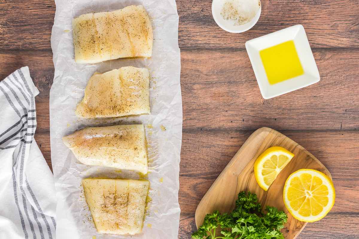 raw haddock with salt and pepper on both sides.